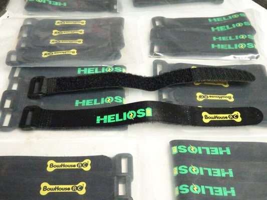 A collection of black non-slip battery straps with the brand name 'Helios' displayed on them, along with various other details.